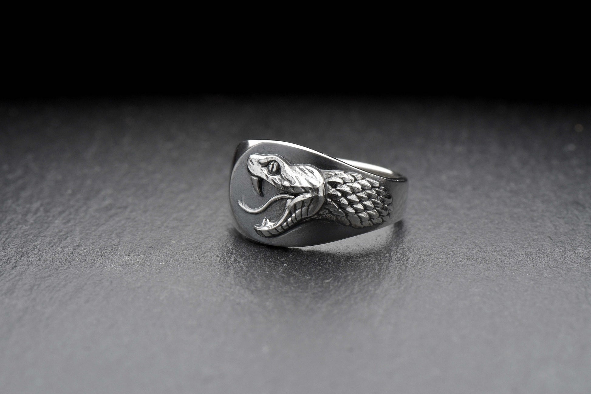 The signet style adds a touch of class and elegance, making this ring perfect for any occasion. Make a statement with this unique and stunning piece of jewelry! (etsy image id: 4051763524)