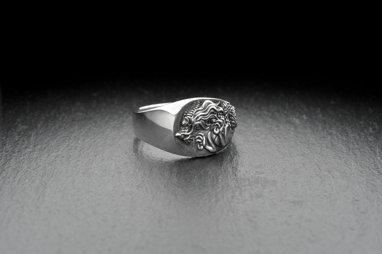Step up your accessory game with this bold and beautiful Chinese Dragon Ring! Made with intricate detailing and expert craftsmanship, this stunning ring is sure to make a statement wherever you go. (etsy image id: 4051864586)