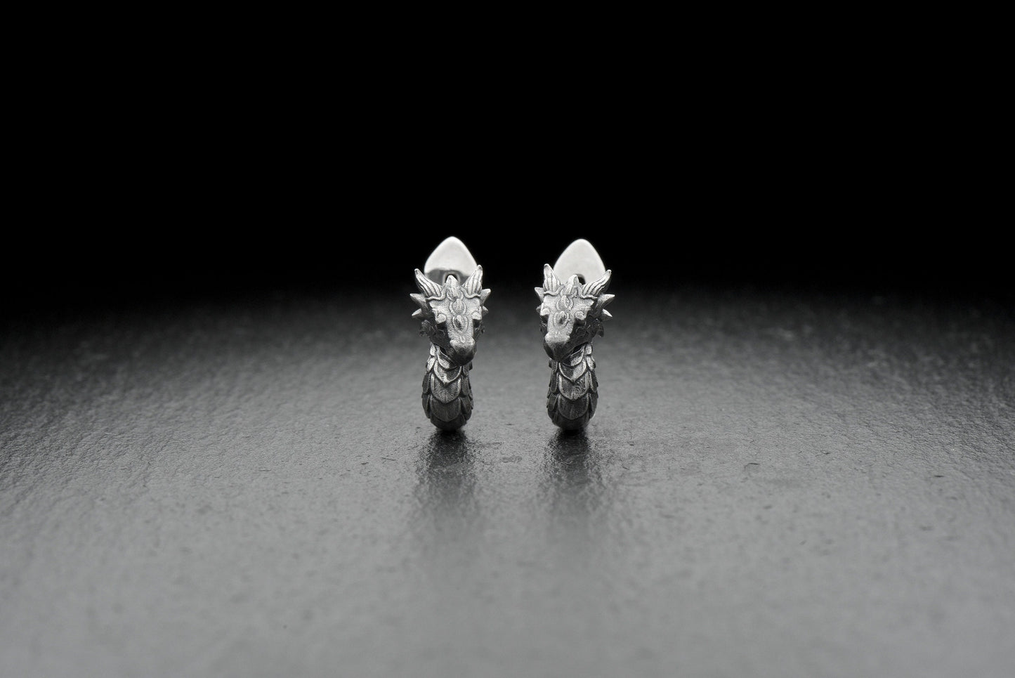 These earrings will complete your look and add variety to your everyday style.  You will always be in the spotlight because this is a thing made with the soul by the hands of a master.

Get them now and rise above the others, like the mighty dragon. (etsy image id: 4193069775)