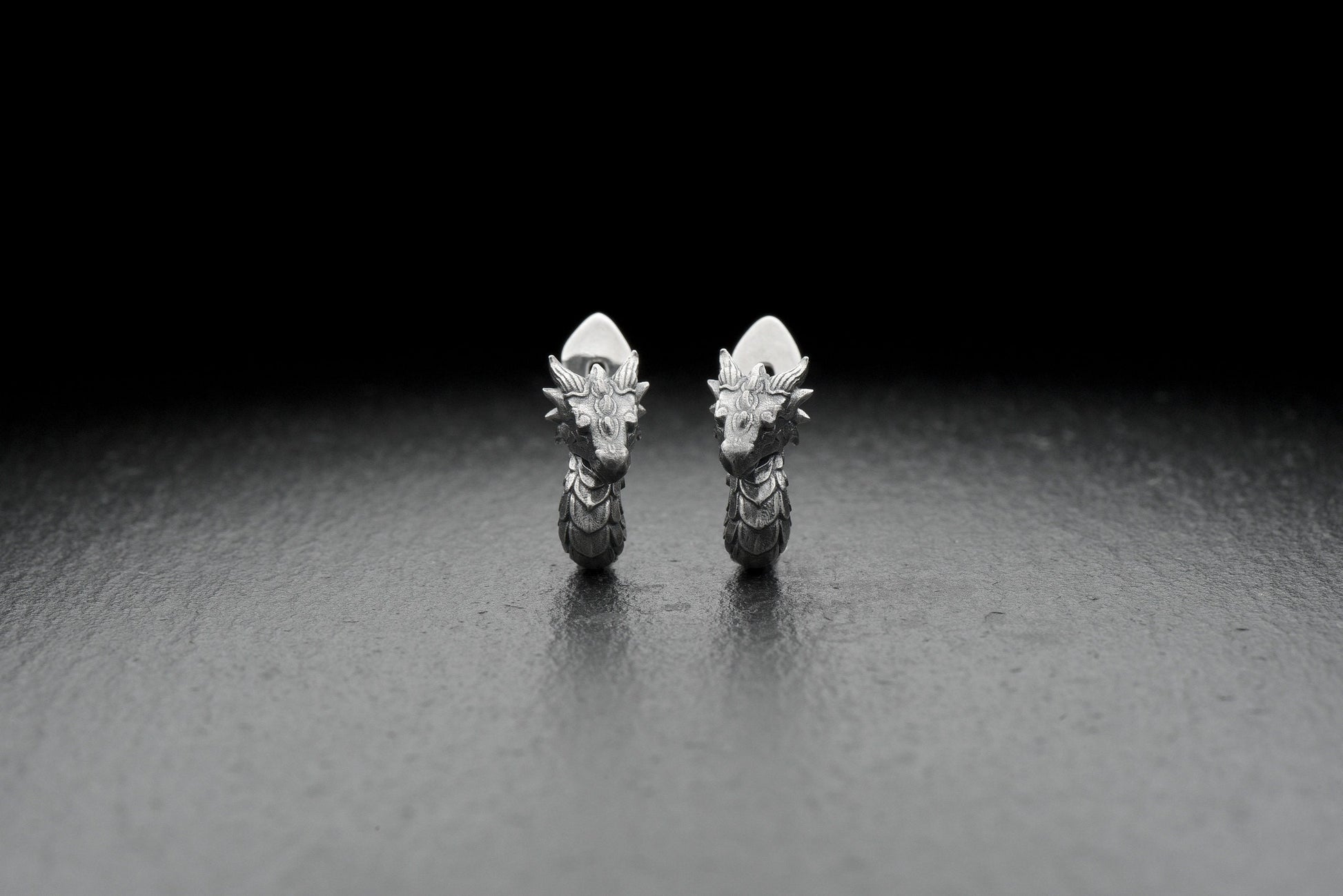 These earrings will complete your look and add variety to your everyday style.  You will always be in the spotlight because this is a thing made with the soul by the hands of a master.

Get them now and rise above the others, like the mighty dragon. (etsy image id: 4193069775)