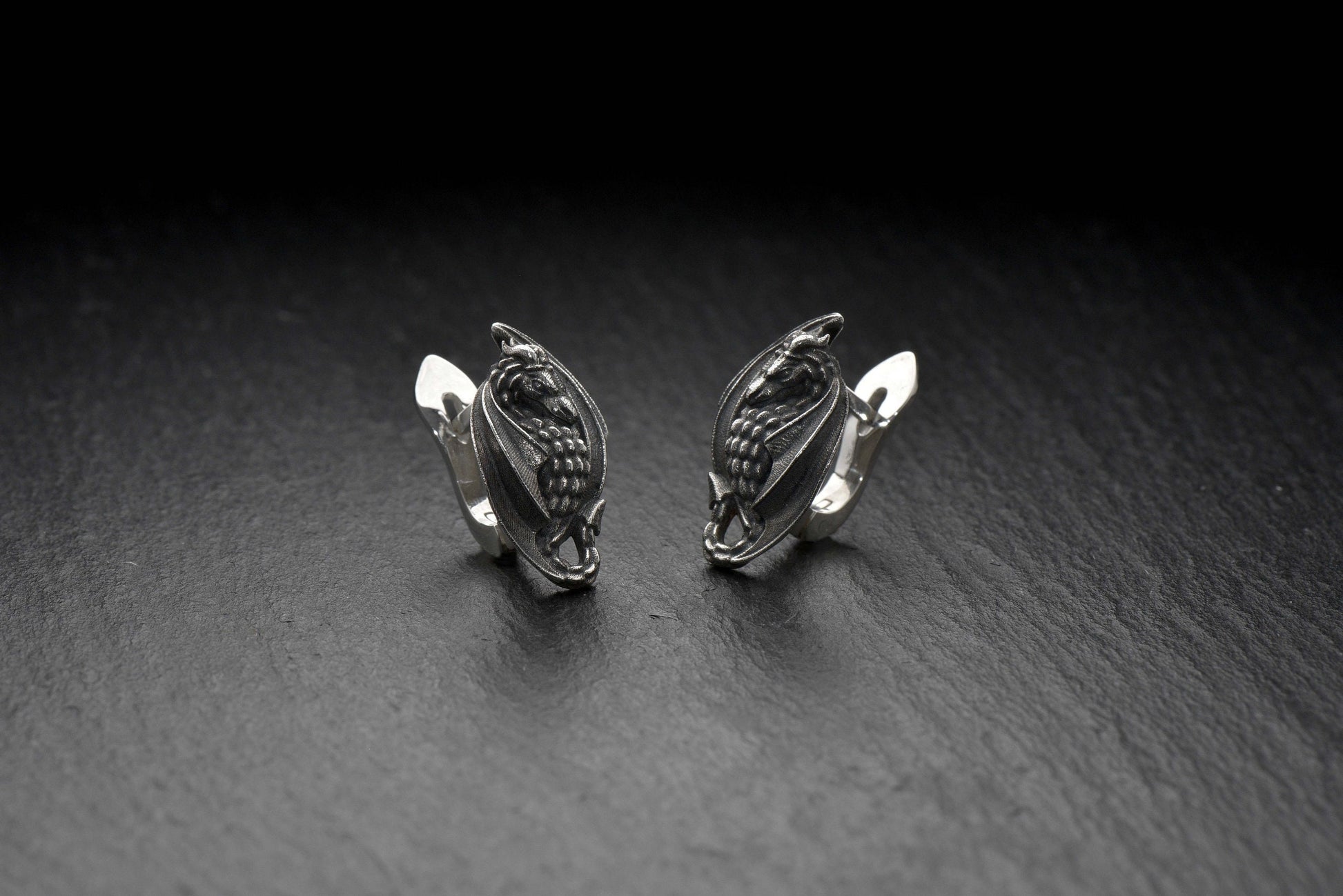 Feel the mystical power of the silver dragons with these unique earrings! The eye-catching design houses ancient dragon energy within its stylish yet timeless look. (etsy image id: 4193110283)