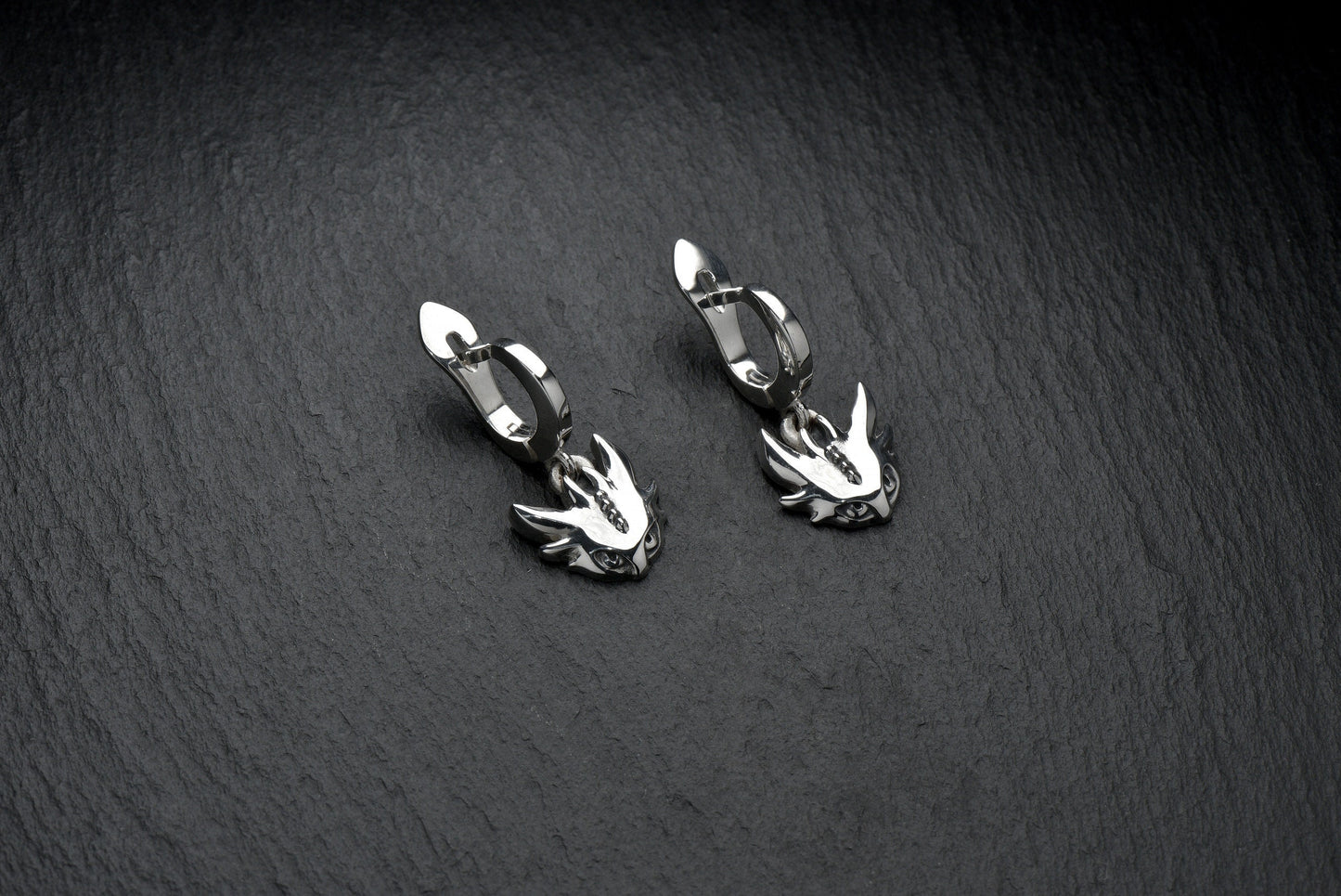 We present you unique silver earrings in the form of dragons - this is a piece of jewelry that will become a real decoration for your image and emphasize your individuality. (etsy image id: 4200683428)