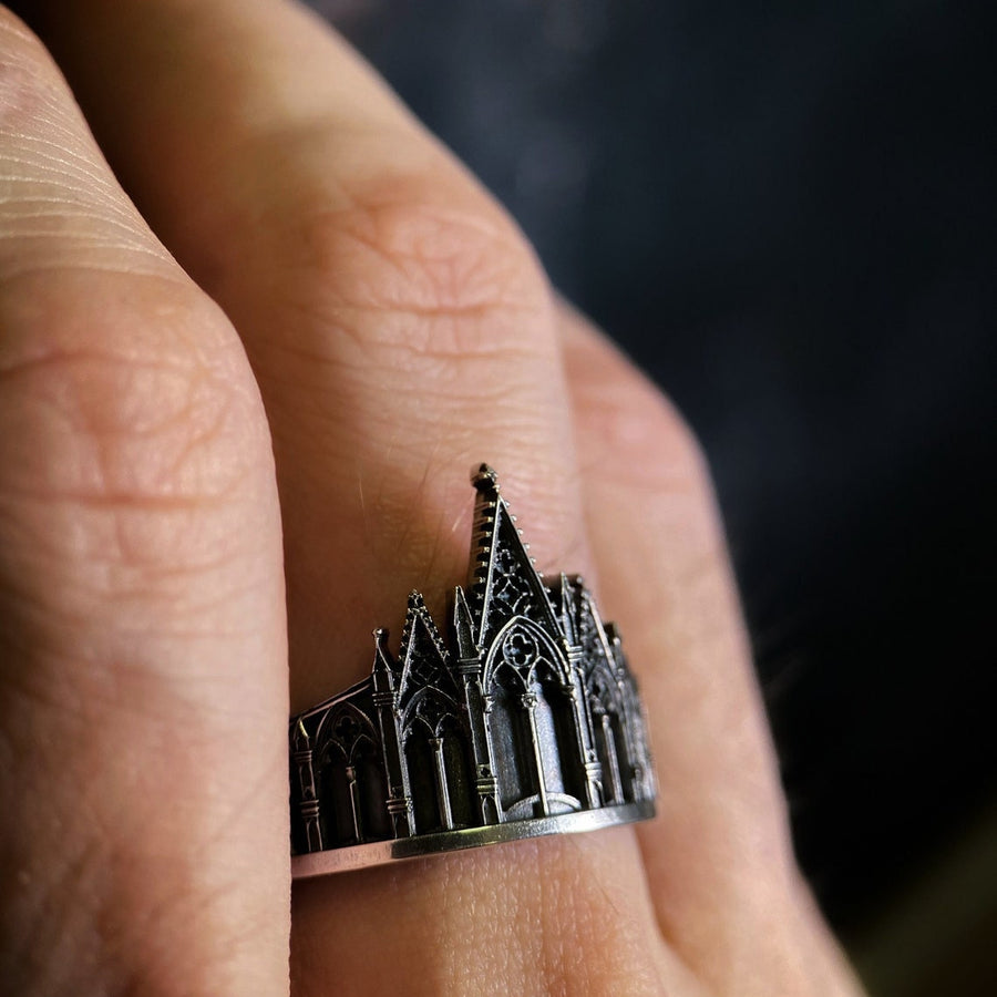 We have rings for people who love to explore the great outdoors, as well as those who love to stay in. With memories and kindness. The image highlights the "chiselled" quality of the 925 sterling silver. The ridges of the rooflines and pillars are sharp and defined, while the background surfaces have a textured, grainy finish like limestone. The oxidation is applied carefully to the "windows" and "doors" of the cathe (etsy image id: 4211827296)