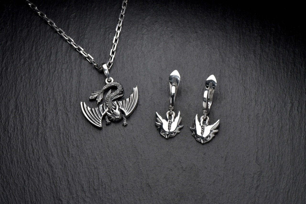 The earrings are made in the form of dragons - mythical creatures symbolizing strength and power. They endow their owner with the same qualities and help her achieve her desired goals. (etsy image id: 4248341309)