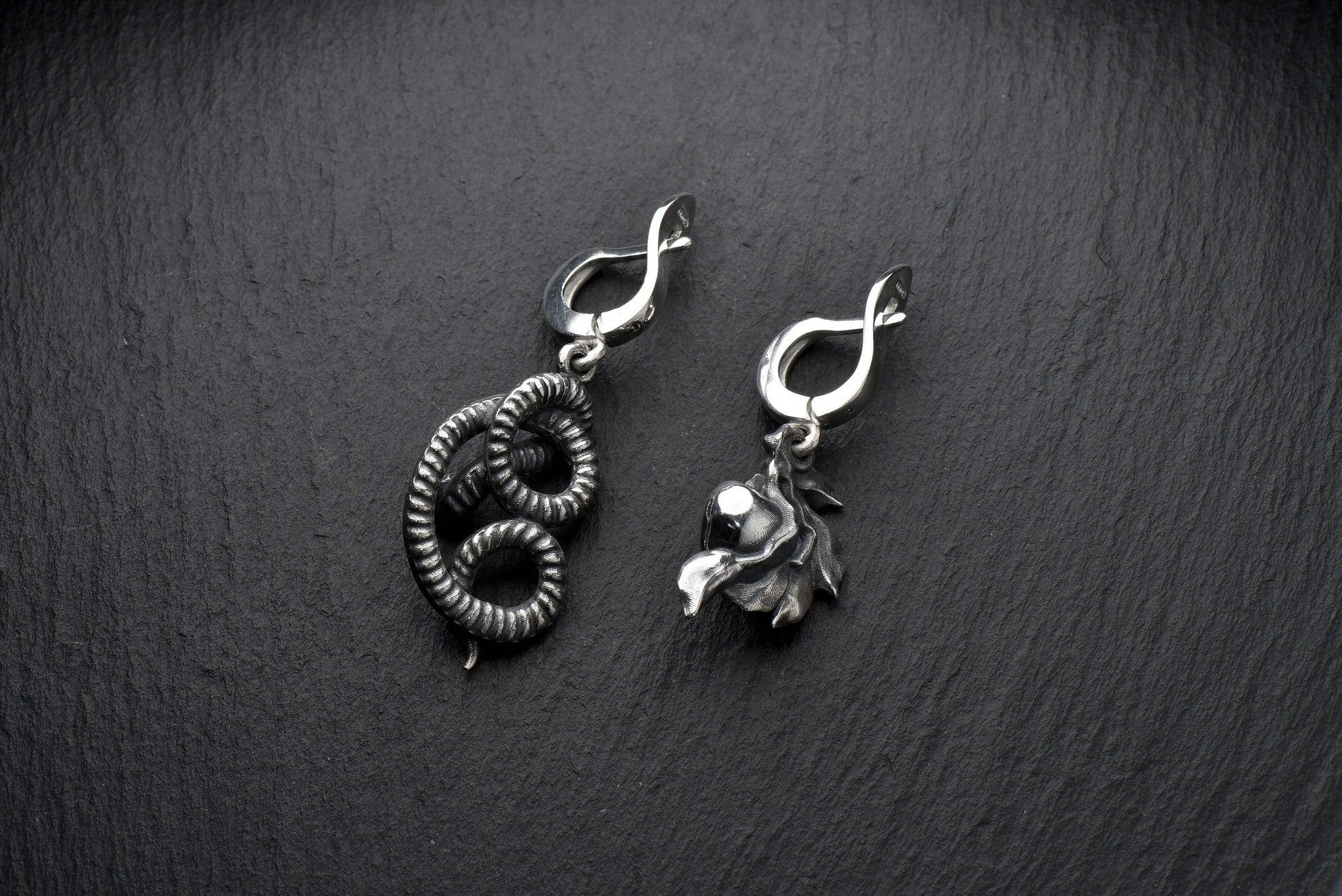 Not only do these earrings look amazing, but they're also comfortable to wear all day long. The lightweight design means you won't even notice you're wearing them, while the secure closure ensures they stay in place no matter what. (etsy image id: 4323182744)