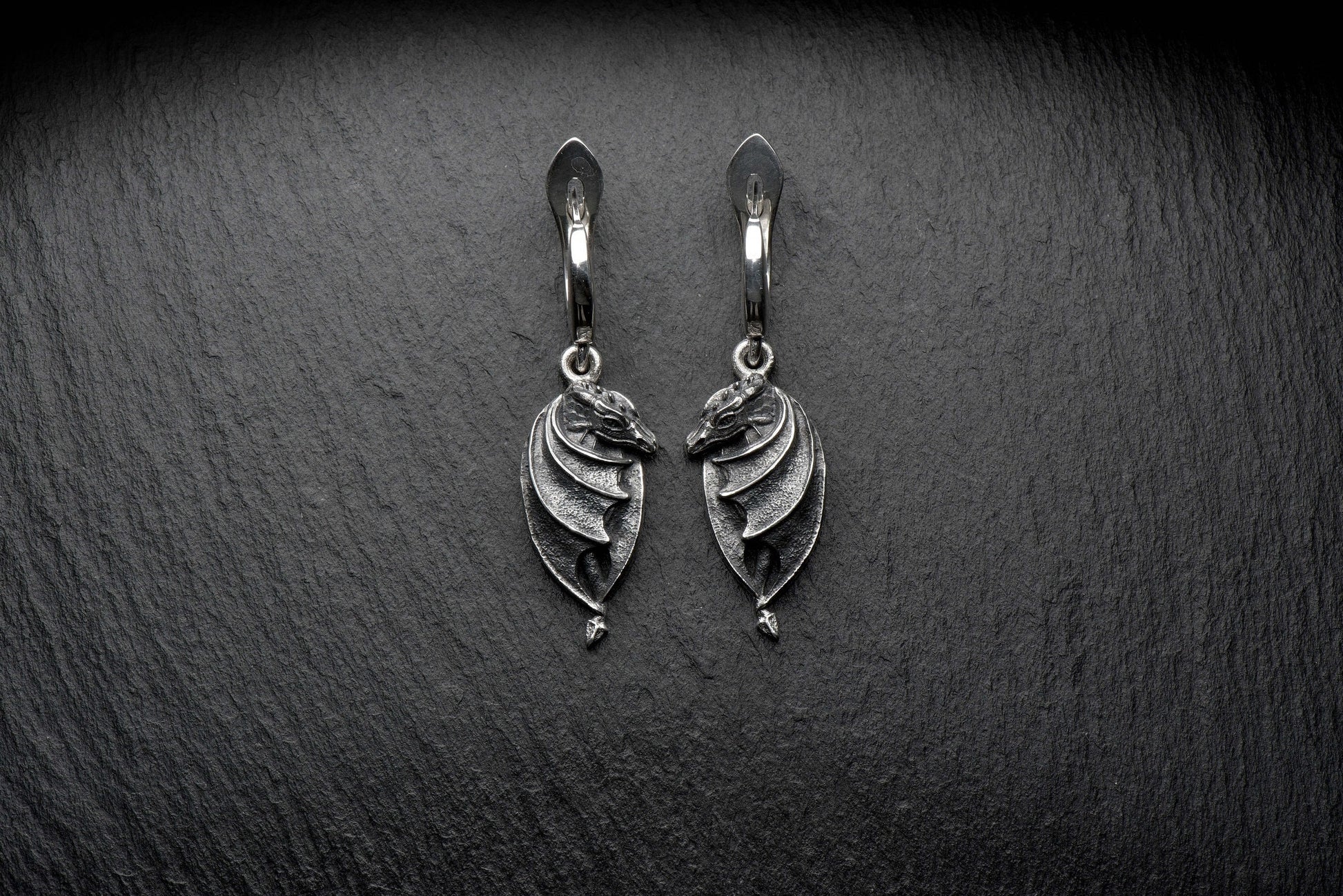These amazing dragon earrings are made by a master craftsman, handcrafted and oxidized. The design is more than just an ordinary dragon, there are many details which make them stand out. (etsy image id: 4365829526)
