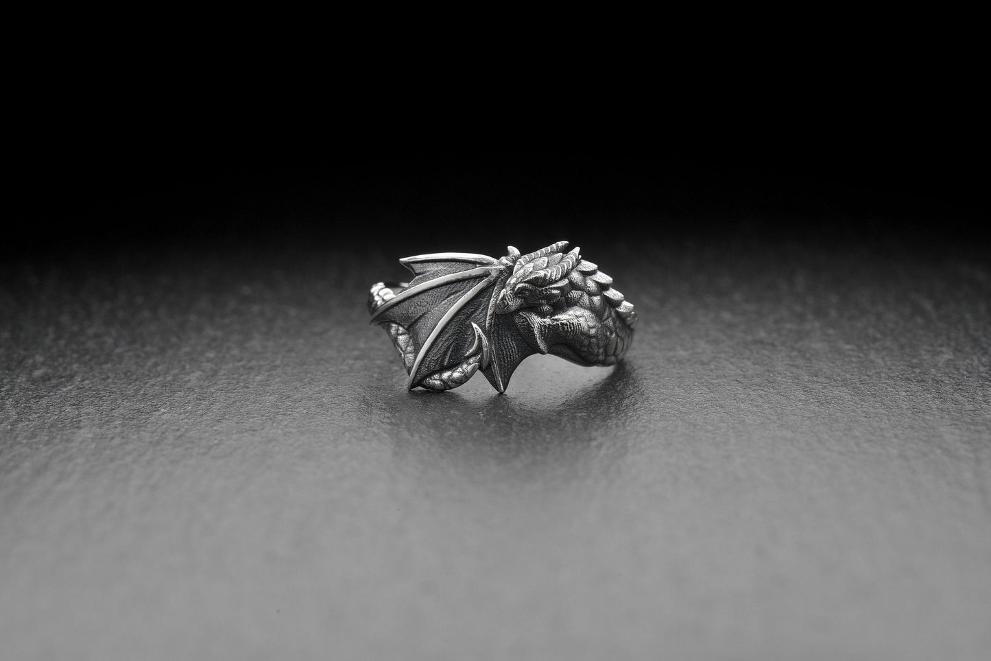 Showcase your confidence with the ancient might of the dragon, jealously admired by those who lay eyes on it. Up your game with this exquisite statement ring – perfect for any special occasion or as a meaningful gift! (etsy image id: 4366865288)