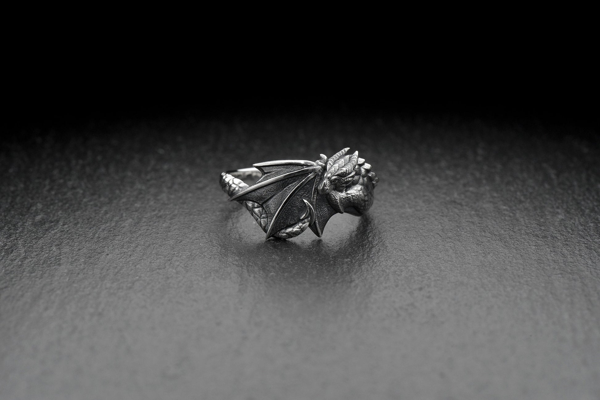 Get ready to ignite your style and have unique power on your finger with this dragon ring. This timelessly elegant ring will make a bold statement while you exude elegance and mystery. (etsy image id: 4366865486)