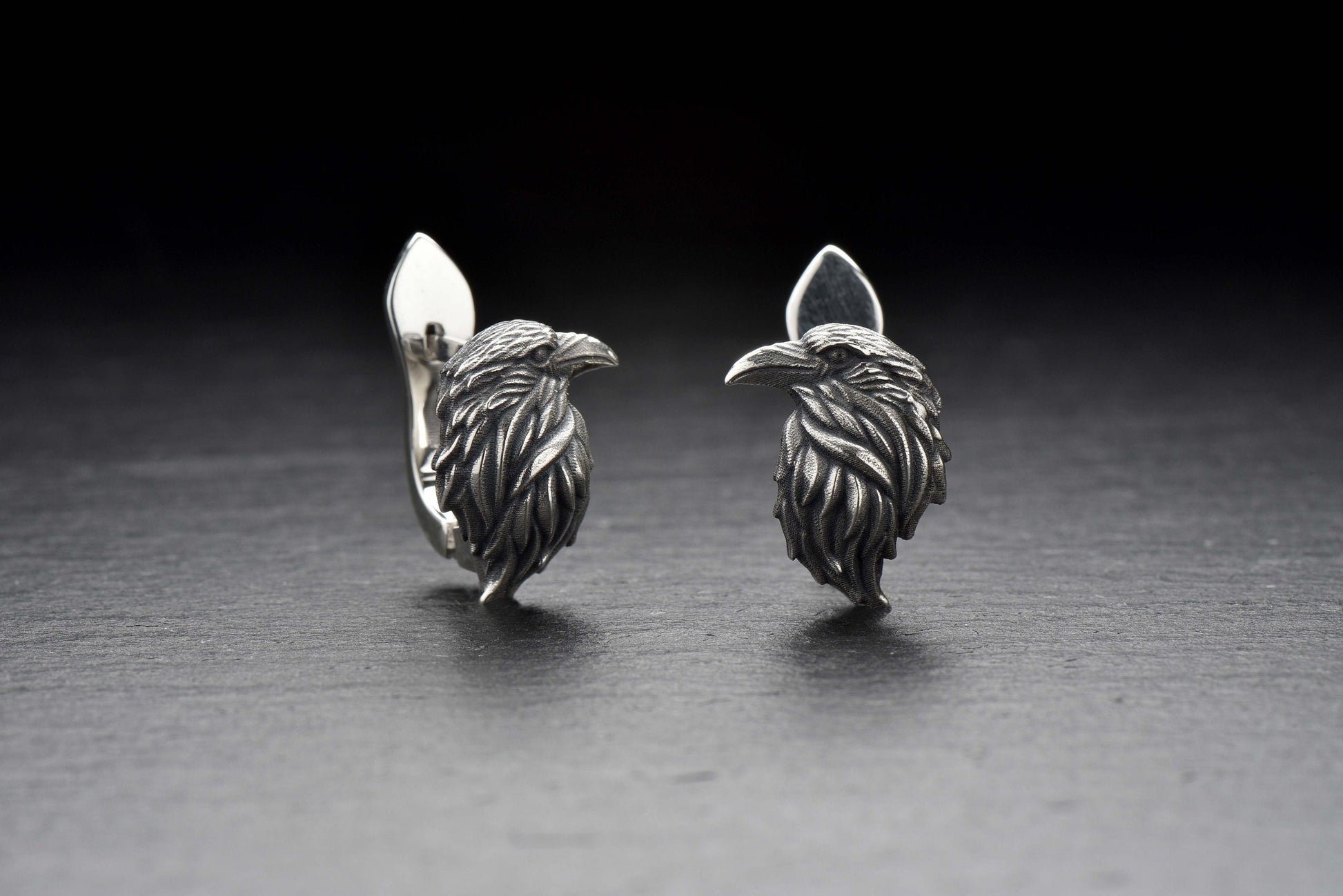 Treat yourself or someone special to these beautiful, unique ravens silver earrings! Carved with a gothic style and shining bright, they represent transformation and freedom. (etsy image id: 4558526592)