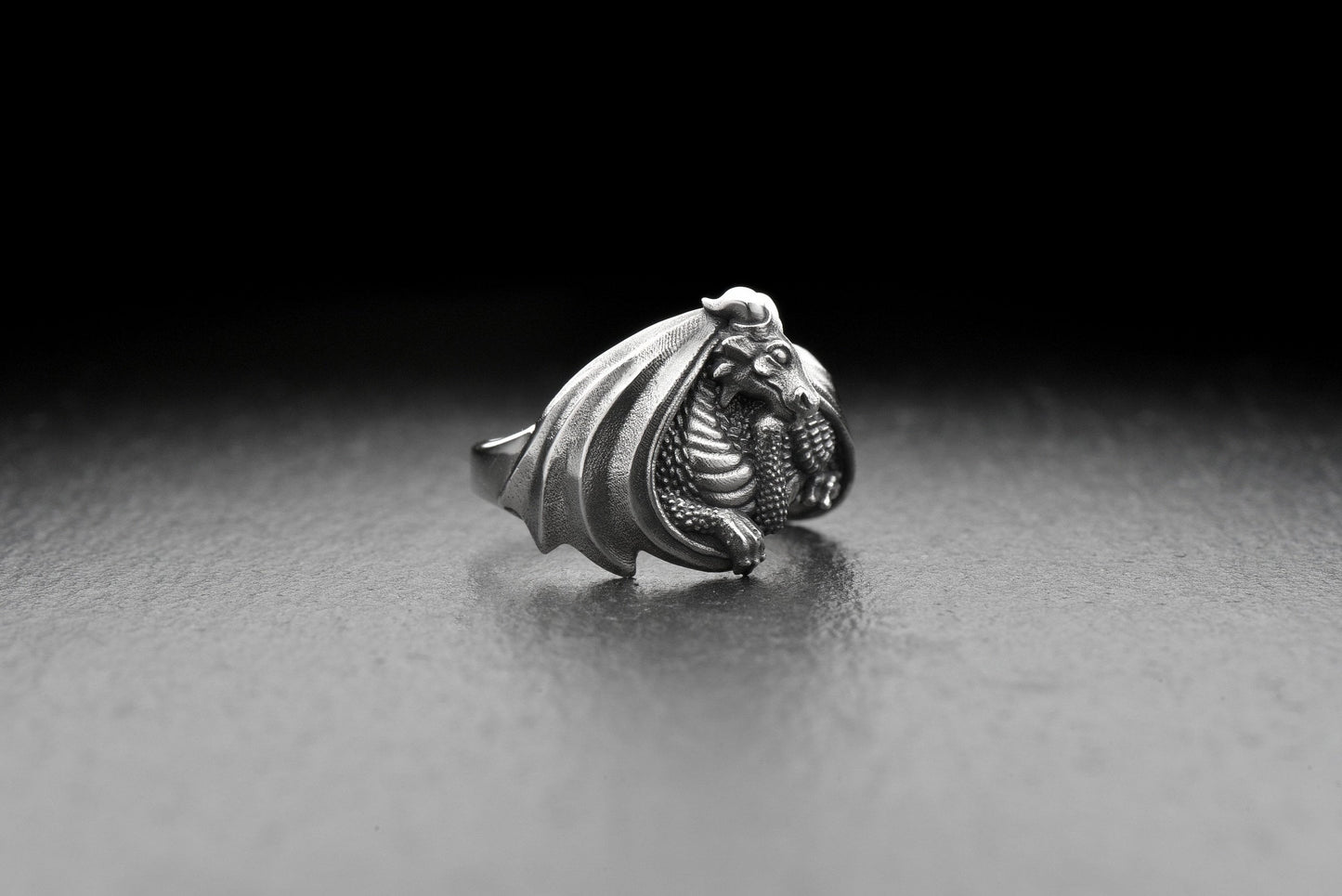 Add a touch of magic to your style with this Dragon Silver Ring! With its elegant design and intricate detailing, this ring is a must-have for any dragon lover. (etsy image id: 4564946486)