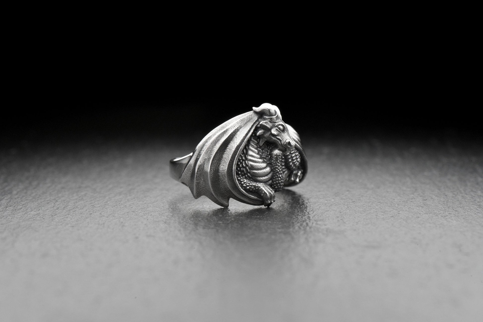 Add a touch of magic to your style with this Dragon Silver Ring! With its elegant design and intricate detailing, this ring is a must-have for any dragon lover. (etsy image id: 4564946486)