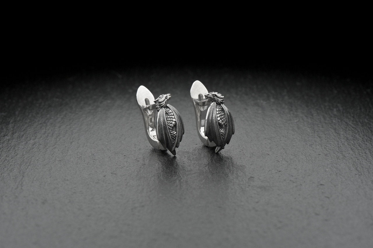 Made from solid sterling silver, they are not just accessories – they are art pieces, forged for those who embrace their inner fire and crave the extraordinary.

Wear the legend. Let your spirit soar. (etsy image id: 4564972704)