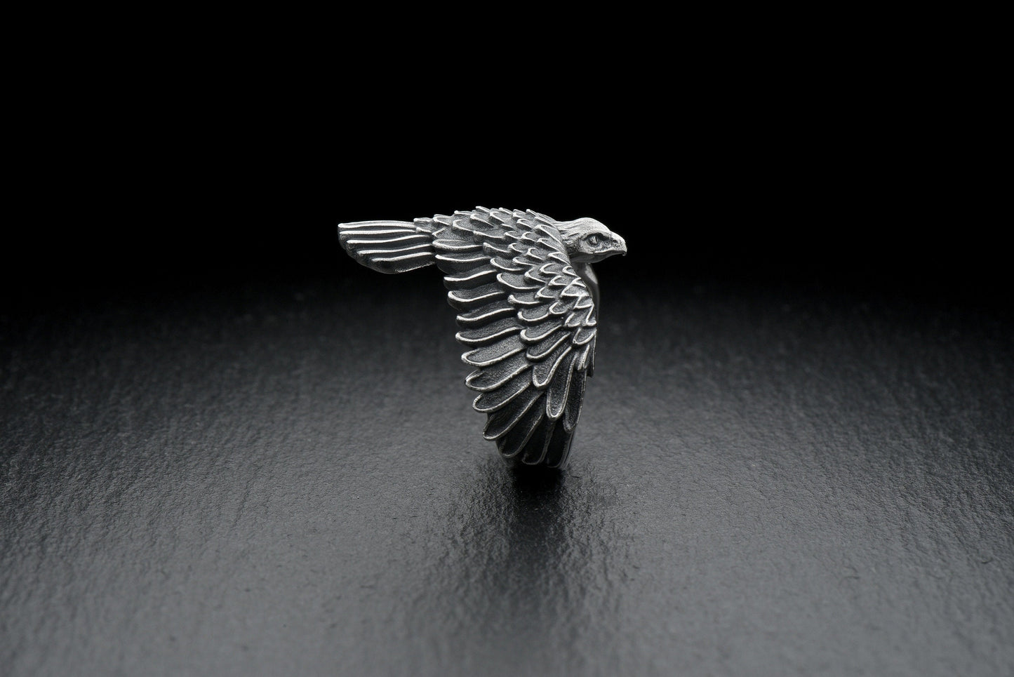The silver used to make this ring symbolizes purity and nobility, while the image of a falcon reminds us of its endurance and sharpness of mind. (etsy image id: 4571661290)