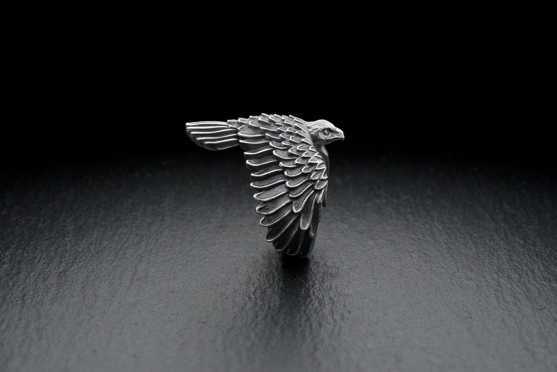 The silver used to make this ring symbolizes purity and nobility, while the image of a falcon reminds us of its endurance and sharpness of mind. (etsy image id: 4571661290)