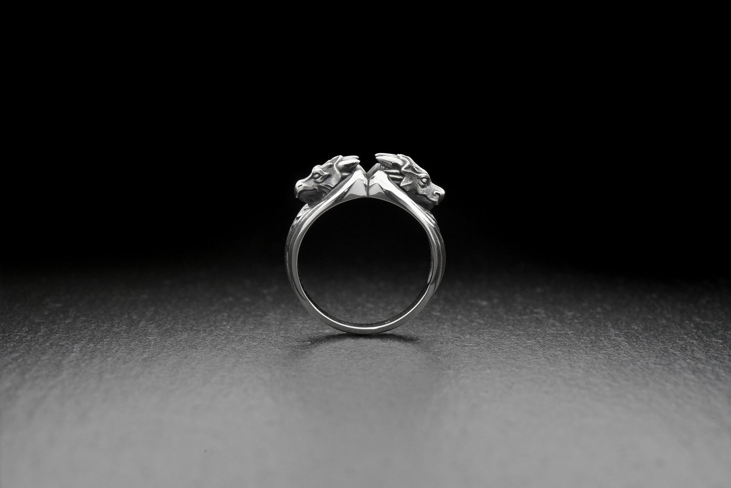 Take your style to the next level with this Silver Ring of Dragons! With its intricate and awe-inspiring design, this ring is the perfect accessory for any dragon lover. (etsy image id: 4611053677)