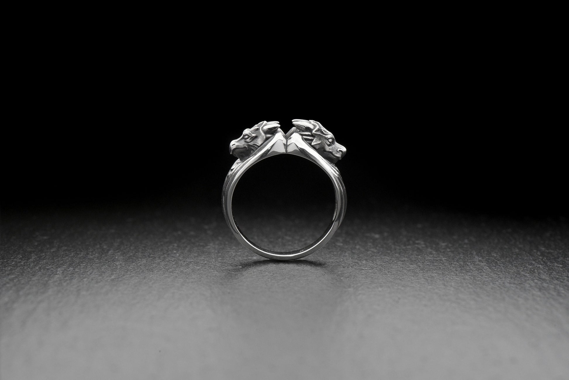 Take your style to the next level with this Silver Ring of Dragons! With its intricate and awe-inspiring design, this ring is the perfect accessory for any dragon lover. (etsy image id: 4611053677)
