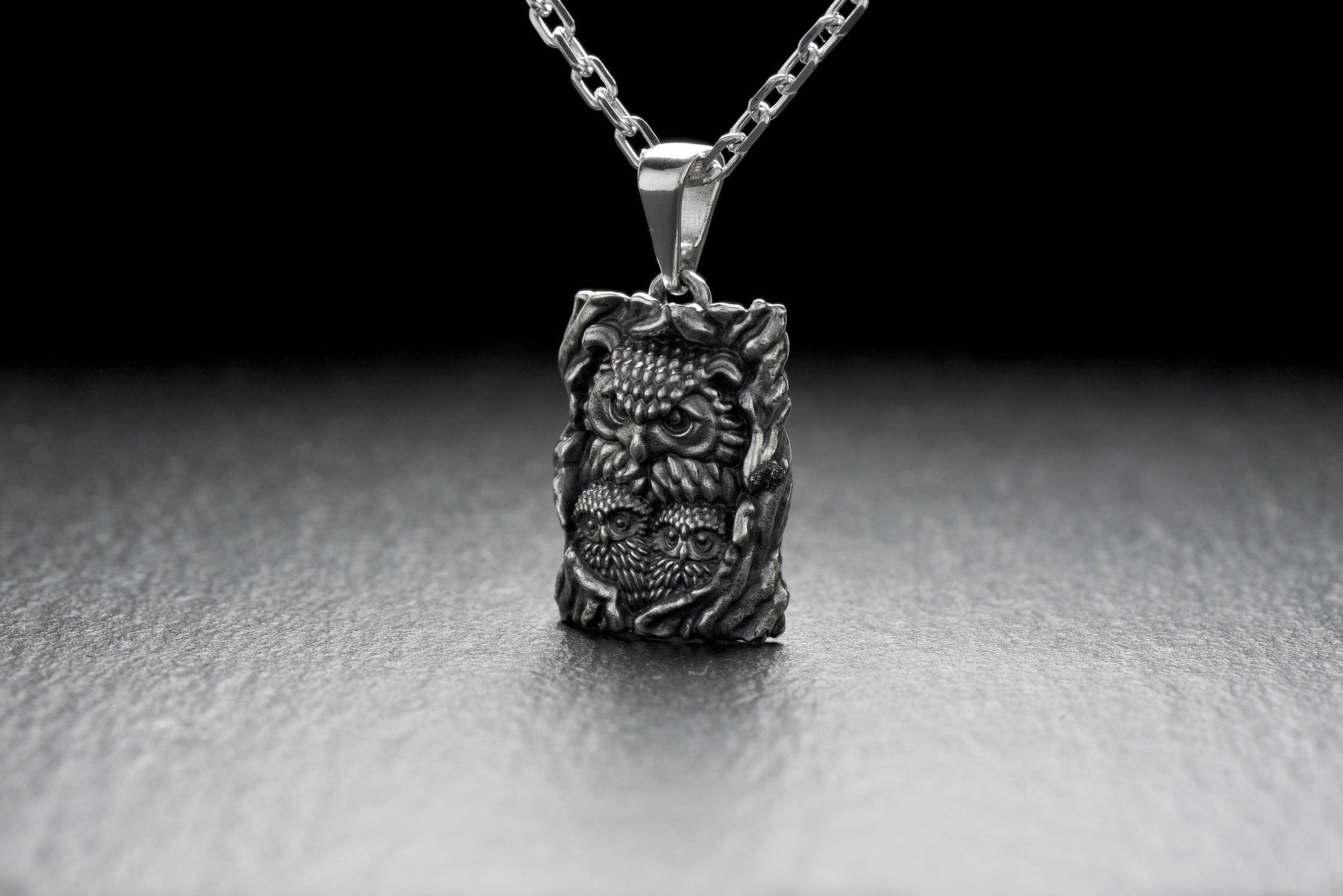 This beautiful pendant is sure to please animal and nature lovers, especially those who value family values.

Each little owl feather and each overflowing mother owl look on the pendant is made with great precision and love for detail. (etsy image id: 4677066468)