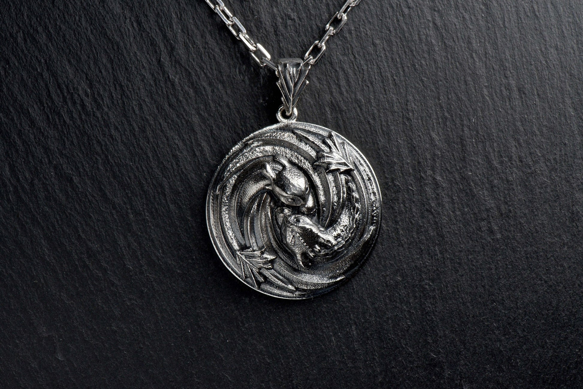 Made from high-quality materials, this pendant is built to last and will add a touch of edgy elegance to any outfit. Don't wait - order yours today and show off your inner dragon! (etsy image id: 4749348440)