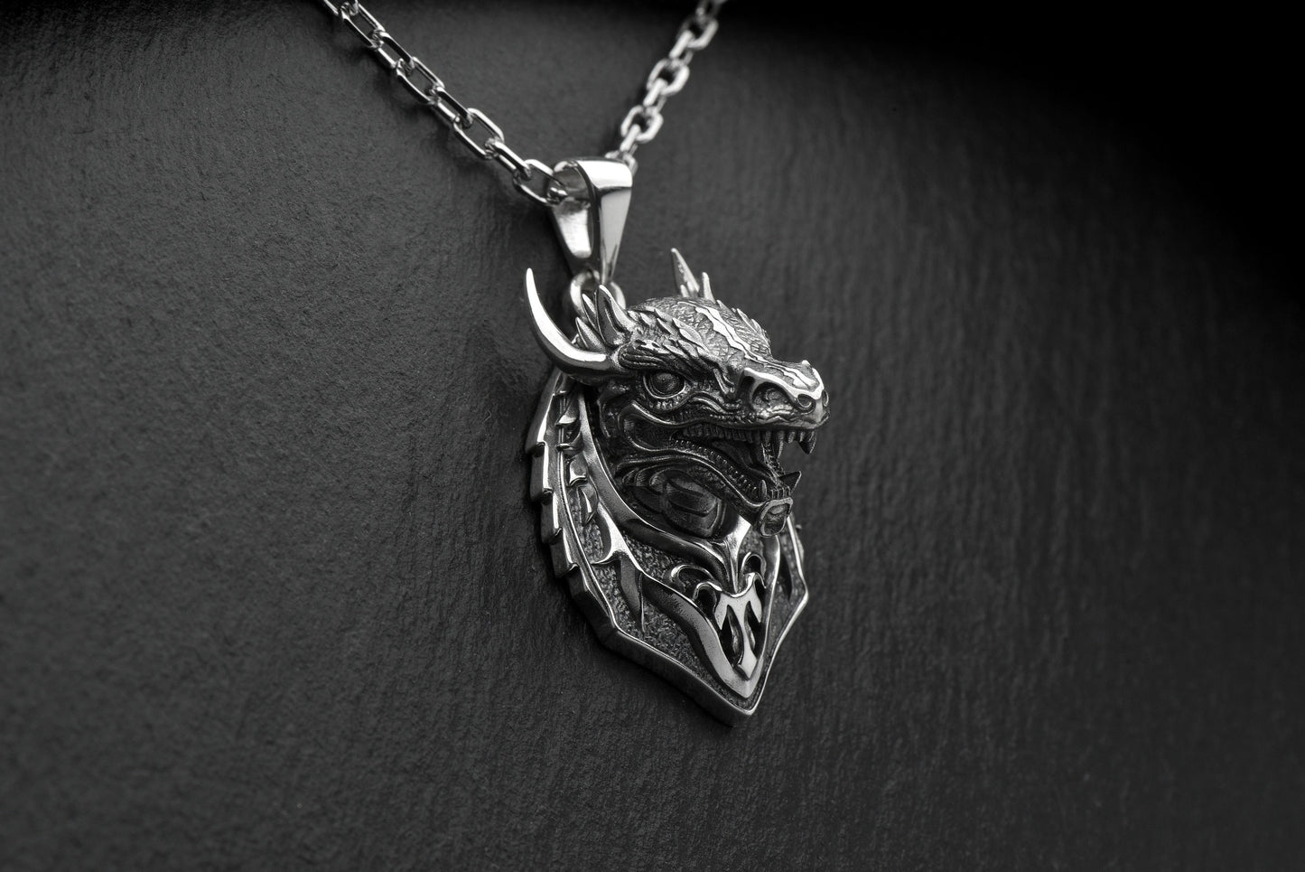 Whether you're looking for a bold statement piece or a subtle addition to your everyday look, this dragon pendant is versatile enough to suit any occasion. (etsy image id: 4804565064)