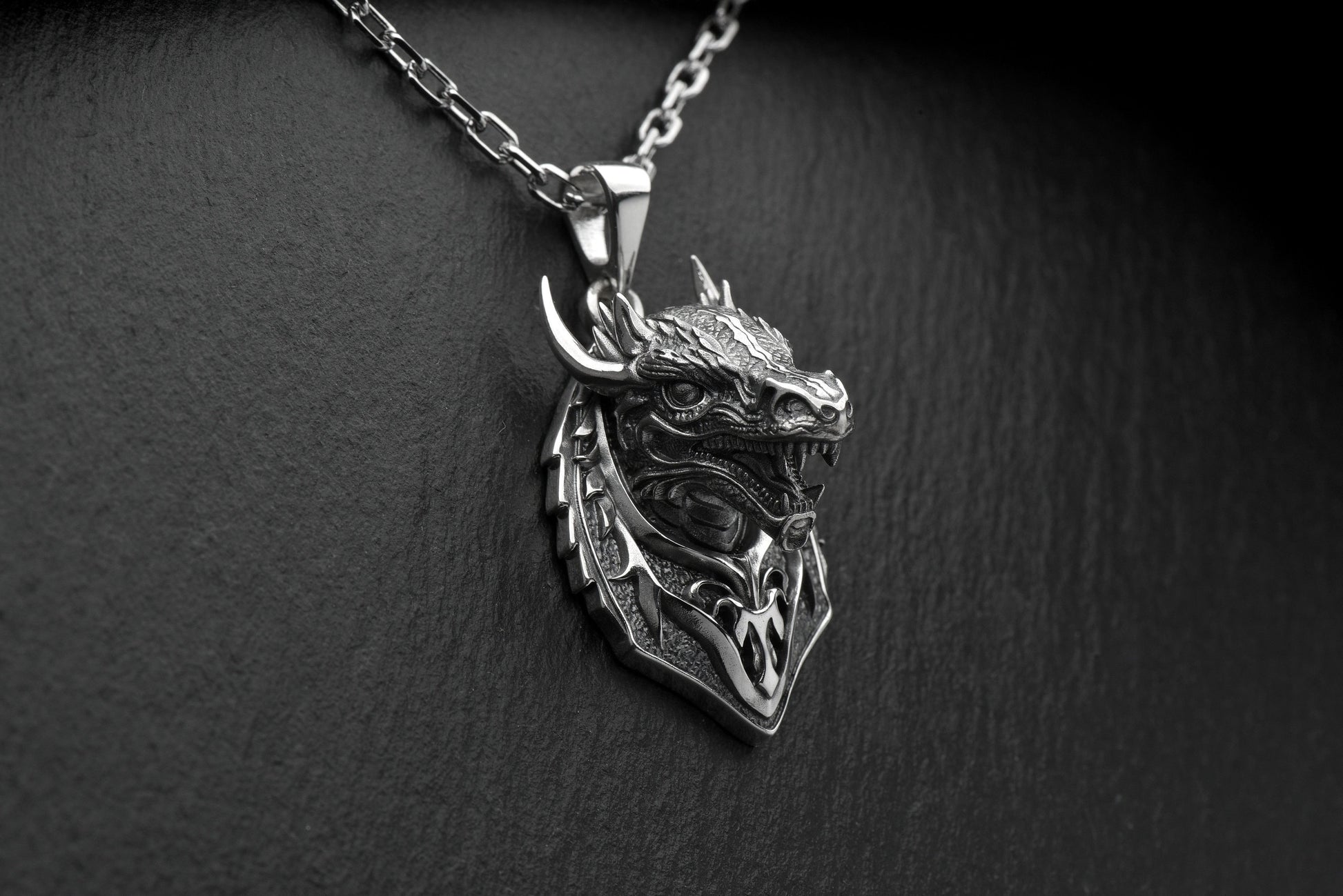 Whether you're looking for a bold statement piece or a subtle addition to your everyday look, this dragon pendant is versatile enough to suit any occasion. (etsy image id: 4804565064)