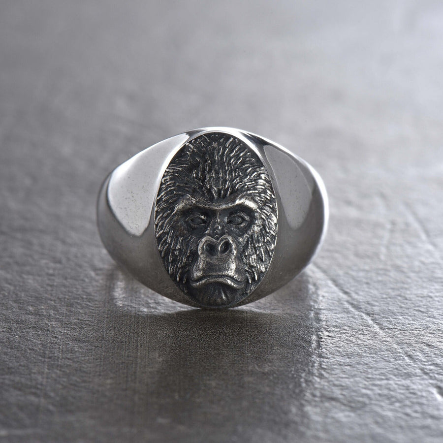 Looking for a unique and stylish ring that will make a statement? Check out our silver gorilla ring! Handcrafted with the utmost attention to detail, this stunning piece features a beautifully detailed gorilla design in solid sterling silver. (etsy image id: 4865275743)