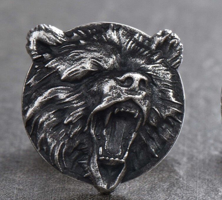 Elevate your style with these handcrafted sterling silver bear cufflinks, designed for those who appreciate both timeless elegance and the rugged spirit of wildlife. Each cufflink captures the strength and grace of the bear, a symbol of confidence, courage, and resilience. (etsy image id: 5749302659)