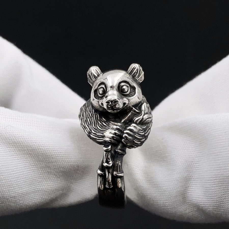 Celebrate the gentle charm of pandas with this beautifully crafted sterling silver panda ring. Designed with intricate detail, this ring captures the playful and endearing spirit of one of nature's most beloved creatures. (etsy image id: 6483013394)