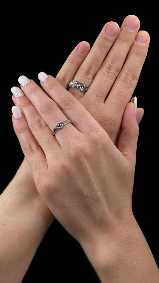 Featuring intricate gothic motifs and a mesmerizing gemstone, this silver ring is a one-of-a-kind piece that will captivate anyone with an eye for unique, elegant jewelry. (etsy image id: 7375563764)