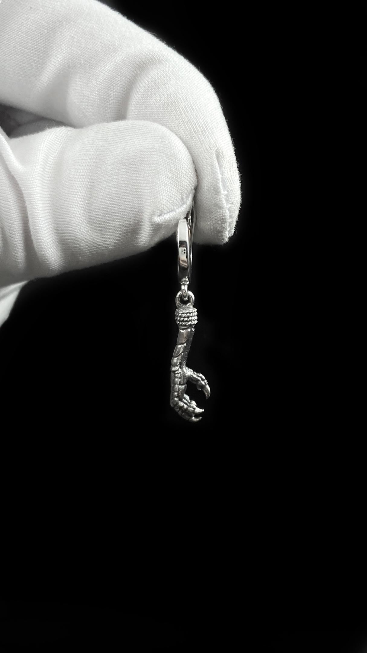 Embrace the wild and mysterious with our Sterling Silver Bird Claw Earrings.
Handcrafted from solid 925 silver, these striking earrings capture the fierce beauty of a bird’s talon — a symbol of freedom, instinct, and strength.

Whether you’re drawn to ravens, eagles, or mythical creatures, this design speaks to those who walk their own path and value meaningful details in their jewelry. (etsy image id: 6941814144)