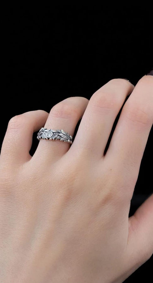 Crafted with care, this gothic silver ring with its vintage charm and gemstone centerpiece will add a touch of dark elegance to any occasion, making it a perfect gift. (etsy image id: 7463722171)