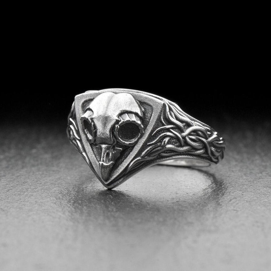 Embrace the mysteries of the night with our Sterling Silver Ring Owl Skull. This hauntingly beautiful piece is a tribute to the enigmatic and elusive spirit of the owl, a creature revered by many cultures for its wisdom and intuition. (etsy image id: 6981604606)