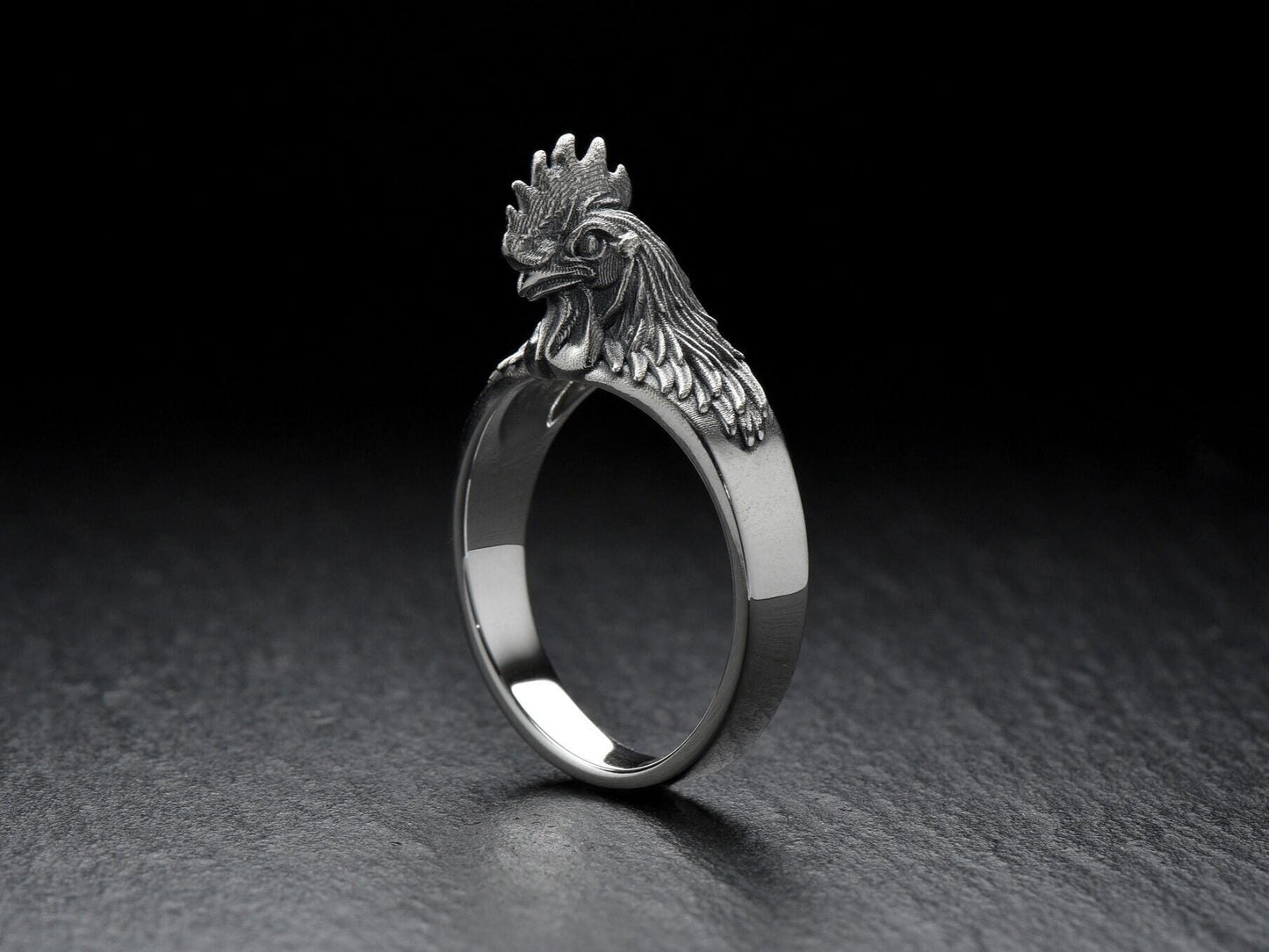 Show off your unique style with a Rooster Silver Ring! Handcrafted and made from sterling silver, this ring is the perfect addition to any outfit. (etsy image id: 6995523004)