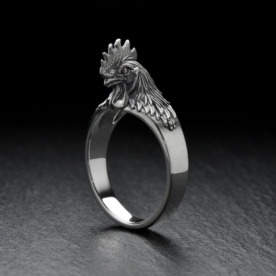Show off your unique style with a Rooster Silver Ring! Handcrafted and made from sterling silver, this ring is the perfect addition to any outfit. (etsy image id: 6995523004)