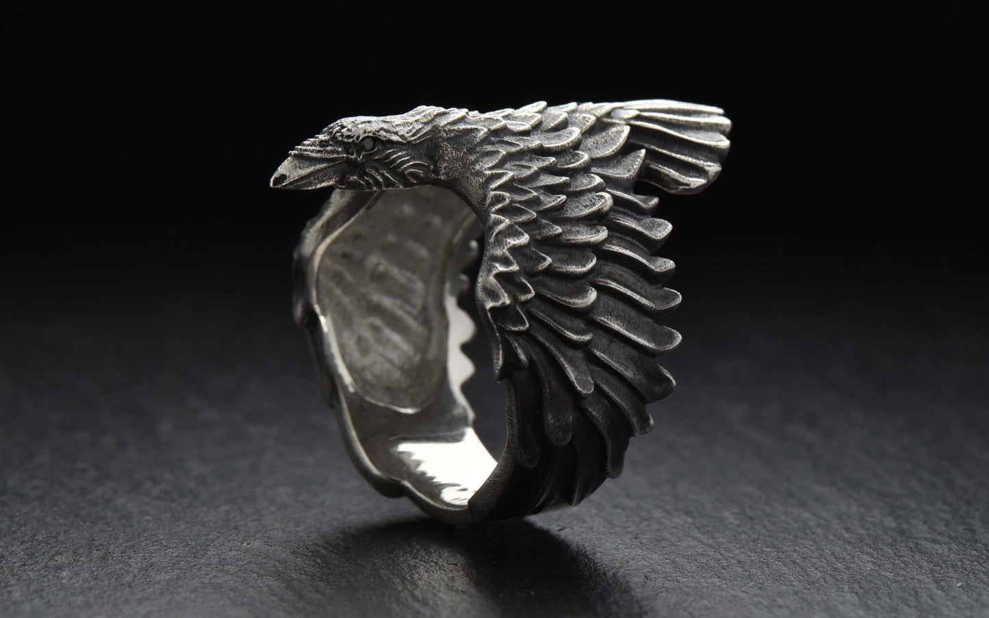 The crow-shaped silver ring is the perfect piece of jewelry for those who appreciate unusual design and symbolism. The raven is not only one of the most intelligent birds in the world, but also a powerful symbol of wisdom, foresight and strength. (etsy image id: 7043621243)