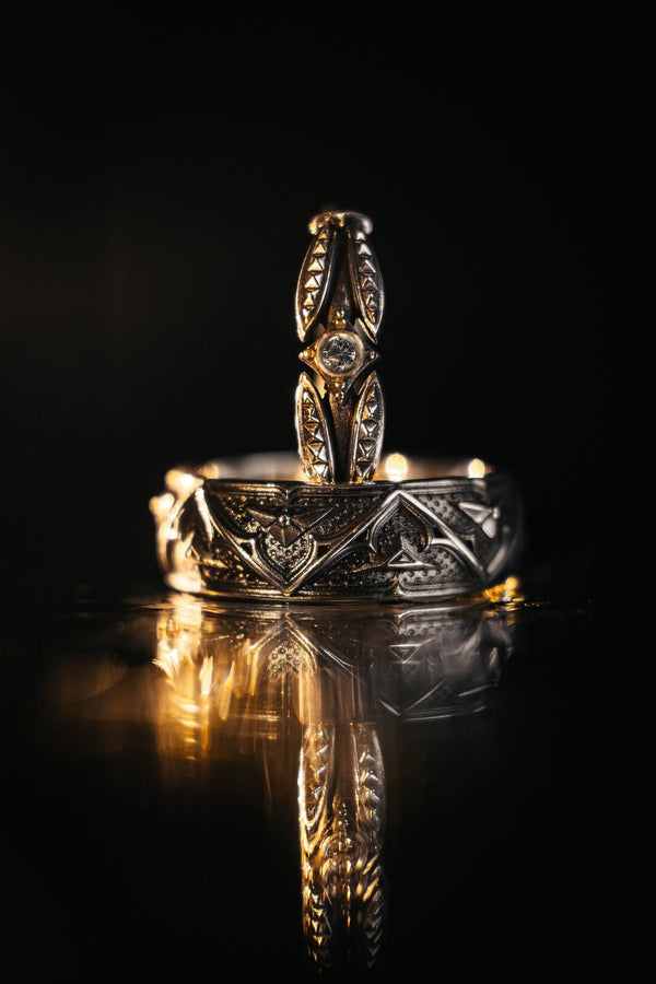 Detailed view of the ring's texture, showing the stippled, hammered finish inside the recessed arches. This "granulation" effect adds a raw, artisan quality to the piece, distinguishing it from mass-produced jewelry. The 925 sterling silver has been treated with sulfur to achieve a permanent dark patina in the low points, ensuring the architectural pattern remains visible even with daily wear. The metal looks solid and durable, suit (etsy image id: 7305774839)