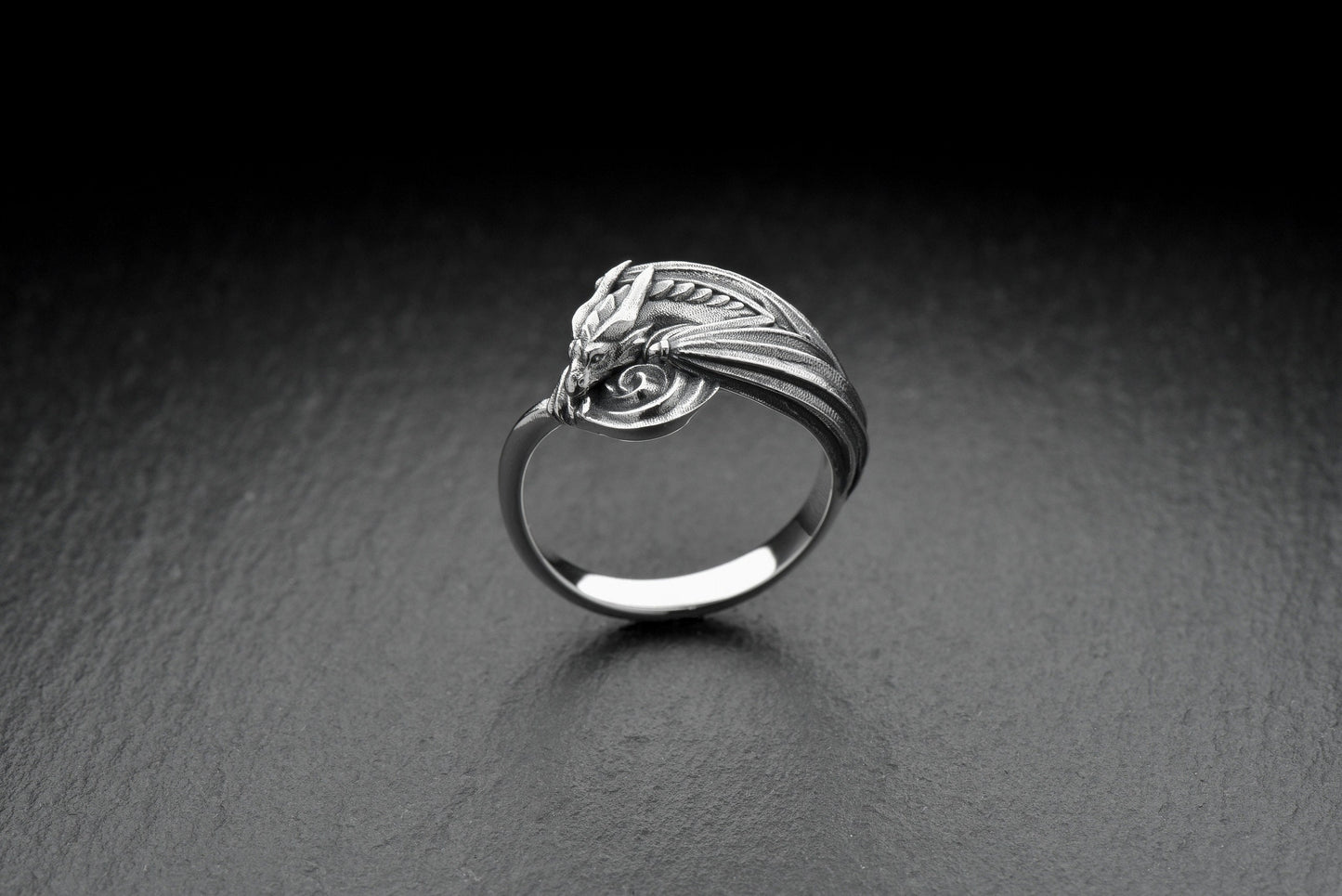 Every dragon lover deserves one of these antique-style silver rings. Inspired by Asian legend, this ring's design is astonishingly detailed. Imagine it sitting inside the palm of your hand. (etsy image id: 7099320726)