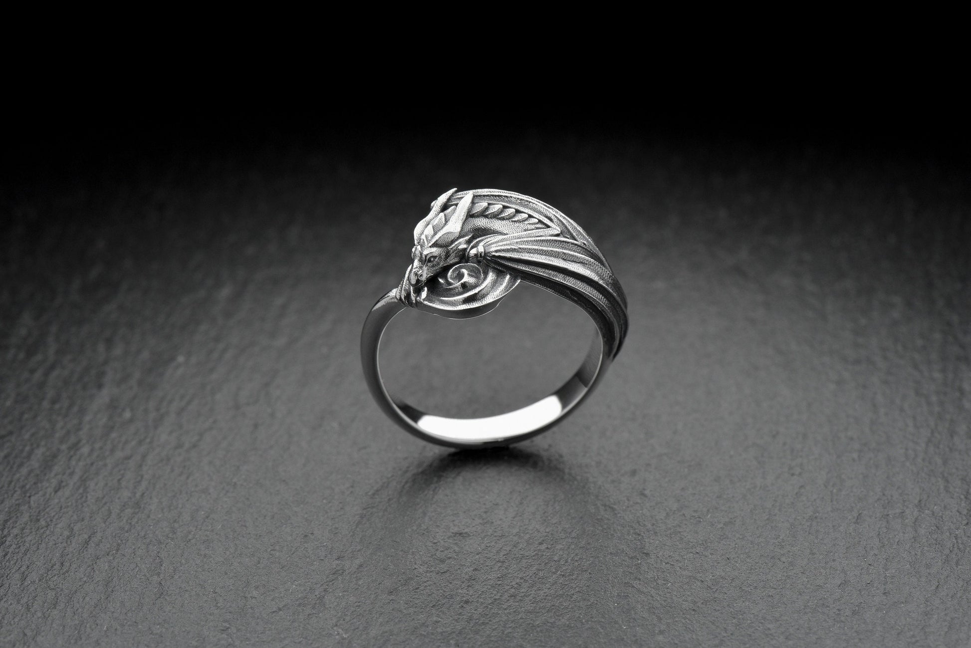 Every dragon lover deserves one of these antique-style silver rings. Inspired by Asian legend, this ring's design is astonishingly detailed. Imagine it sitting inside the palm of your hand. (etsy image id: 7099320726)