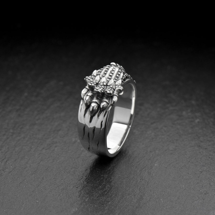 Made with high-quality sterling silver, this ring is both stylish and durable. Whether you're dressing up for a night out or adding a touch of edge to your everyday look, this ring is the perfect accessory. (etsy image id: 7099610710)