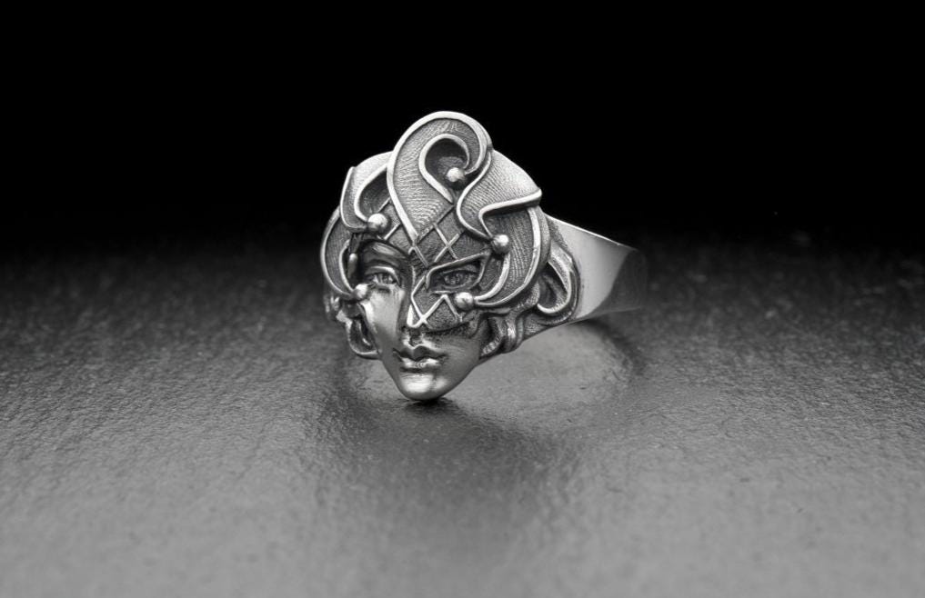 The ring is made of high quality sterling silver and has a solid construction. It also has a unique design and an eye-catching look that is guaranteed to grab the attention of others. (etsy image id: 7212373992)