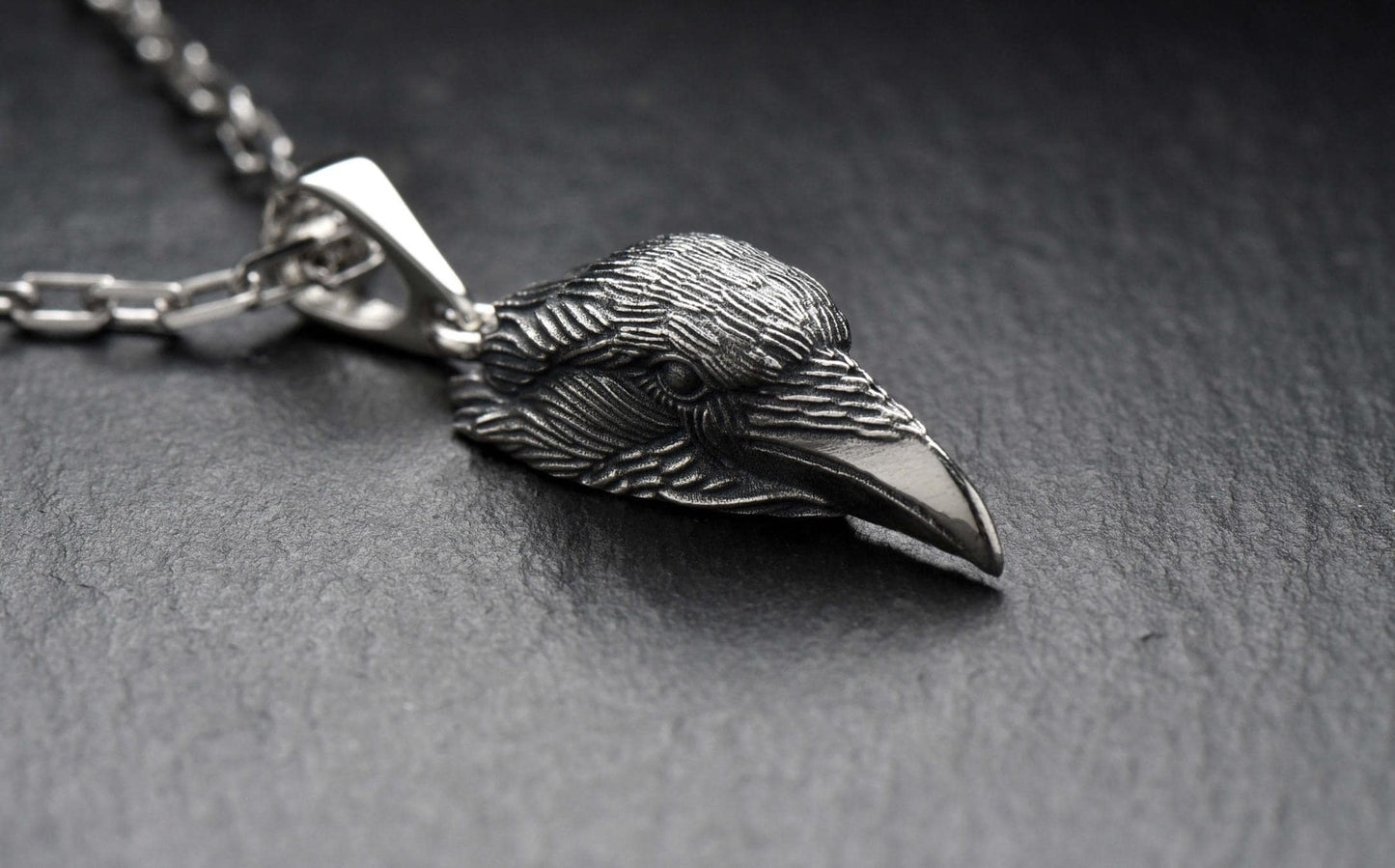 Raven is a symbol of wisdom and intelligence, as well as the personification of spirituality and mysticism. The head of a raven on a pendant can serve as a reminder of the importance of searching for truth, learning and developing consciousness.