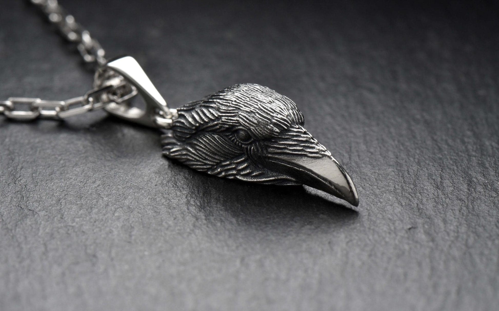 Raven is a symbol of wisdom and intelligence, as well as the personification of spirituality and mysticism. The head of a raven on a pendant can serve as a reminder of the importance of searching for truth, learning and developing consciousness.
