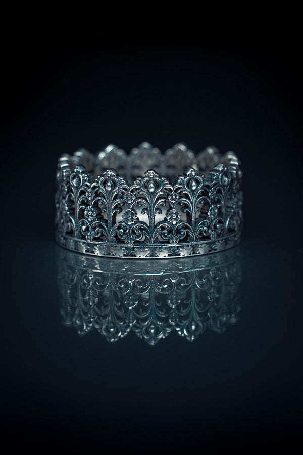 Step into the charm of vintage elegance with our Sterling Silver Wattle Fence Ring. This unique piece is inspired by the intricate patterns of traditional wattle fencing, meticulously crafted to capture its rustic beauty.

Whether you’re a fan of gothic jewelry or seeking a unique statement piece, this ring is a perfect choice. Embrace the beauty of craftsmanship with our Wattle Fence Ring, a timeless addition to your collection. (etsy image id: 7308354807)