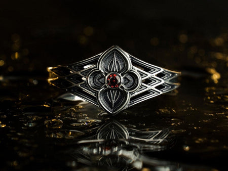 A perfect blend of vintage gothic design and modern elegance, this sterling silver ring with its gemstone centerpiece is a stunning addition to any jewelry collection. (etsy image id: 7375630654)