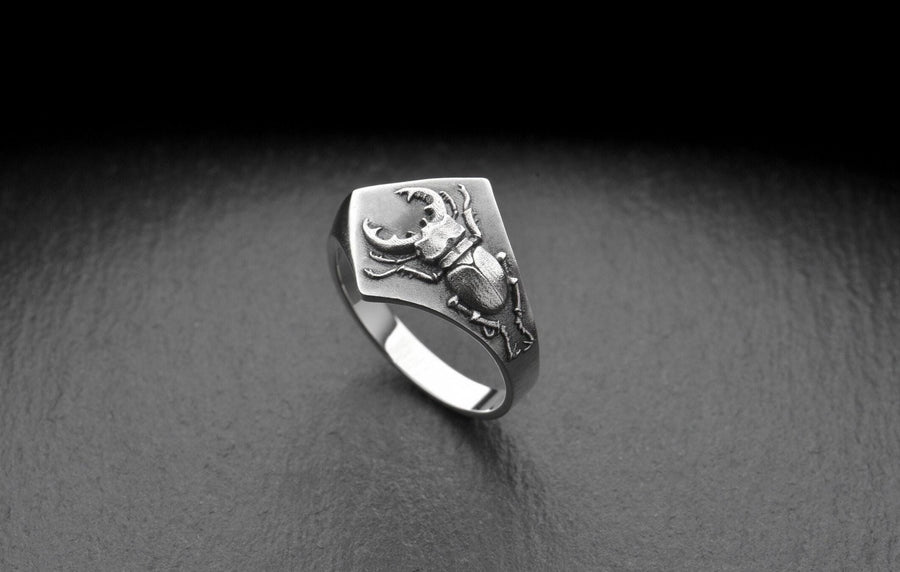 Look no further than this silver stag beetle ring! Handcrafted with care, this ring features a beautifully detailed stag beetle design that is sure to turn heads. (etsy image id: 4673645152)