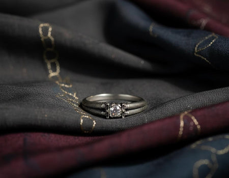 This sterling silver engagement ring features detailed Greek column motifs running around the band, inspired by ancient temples and classical architecture. Its Art Deco lines highlight symmetry and craftsmanship, while the raised stone setting adds elegance. Designed for lovers of historic aesthetics, it makes a striking proposal or anniversary gift. (etsy image id: 7417720808)