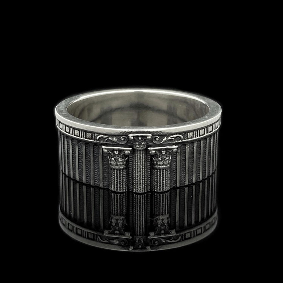 A handcrafted silver band ring with an ancient architectural theme. The carved columns and decorative patterns resemble historic Greek structures, giving the jewelry a symbolic and powerful presence. The design suits collectors of classical art, mythology enthusiasts and anyone who values bold and meaningful accessories. (etsy image id: 7417729506)