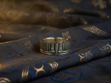This sterling silver ring features a detailed Greek temple motif with fluted columns, ornamental capitals and a bold architectural structure. Its wide band design captures the grandeur of classical stone buildings, blending ancient inspiration with modern craftsmanship. Ideal for lovers of historical art, neoclassical aesthetics and unique statement jewelry. (etsy image id: 7417755844)