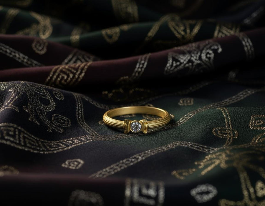 The photograph captures a slim Victorian silver ring with a gemstone framed by sculpted column motifs. Fine linear textures cover the band, giving it a classical, antique appeal. The gemstone sparkles softly, contrasting the darker oxidized grooves. This intricate design suits those who appreciate architectural jewelry, artistic detailing, and meaningful handmade engagement pieces. (etsy image id: 6976743880)