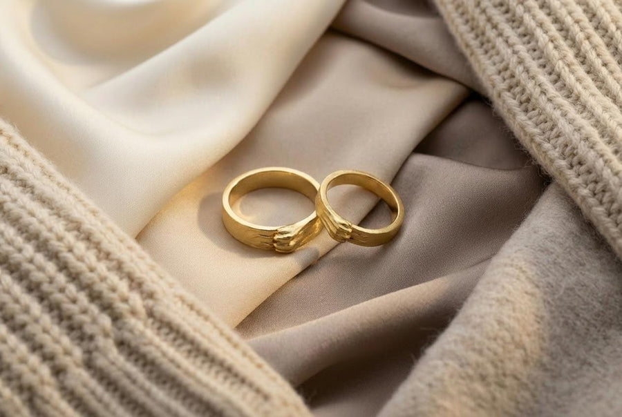 A pair of gothic sterling silver wedding rings featuring sculpted claw details that wrap organically around each band. The dramatic design blends polished metal with textured claw surfaces, creating a symbolic representation of unity and strength. Ideal for alternative couples who appreciate bold artisan jewelry with dark, meaningful aesthetics and handcrafted quality suitable for weddings or promise rings.