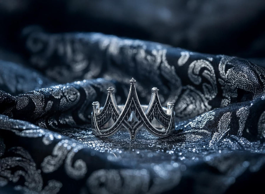 statement ring,	silver ring,	rare ring, gothic architecture,	goth ornament,	gothic window, The image highlights the depth of the casting. The 925 sterling silver features two distinct textures: the smooth, reflective structural lines and the gritty, matte "chainmail" texture within the arches. The oxidation gives the ring an antique patina, making it look like a forged artifact rather than a stamped piece of metal. (etsy image id: 7028750895)